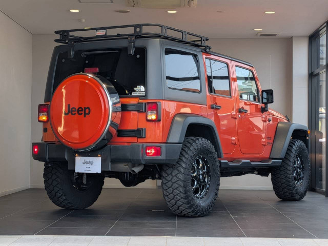 ジープ ラングラー アンリミテッド サンセット オレンジ 4WDの中古車